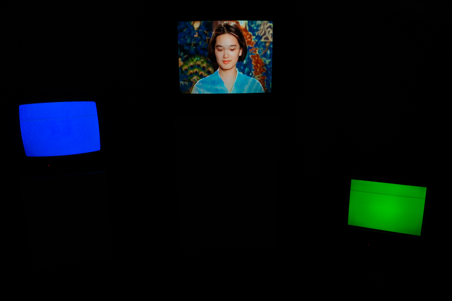 Image of 3 CRT video monitors; a three-channel CRT video installation
