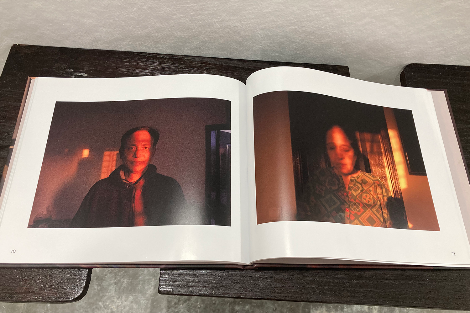 Close up image of a photobook featuring Abdullah Jahangir's parents