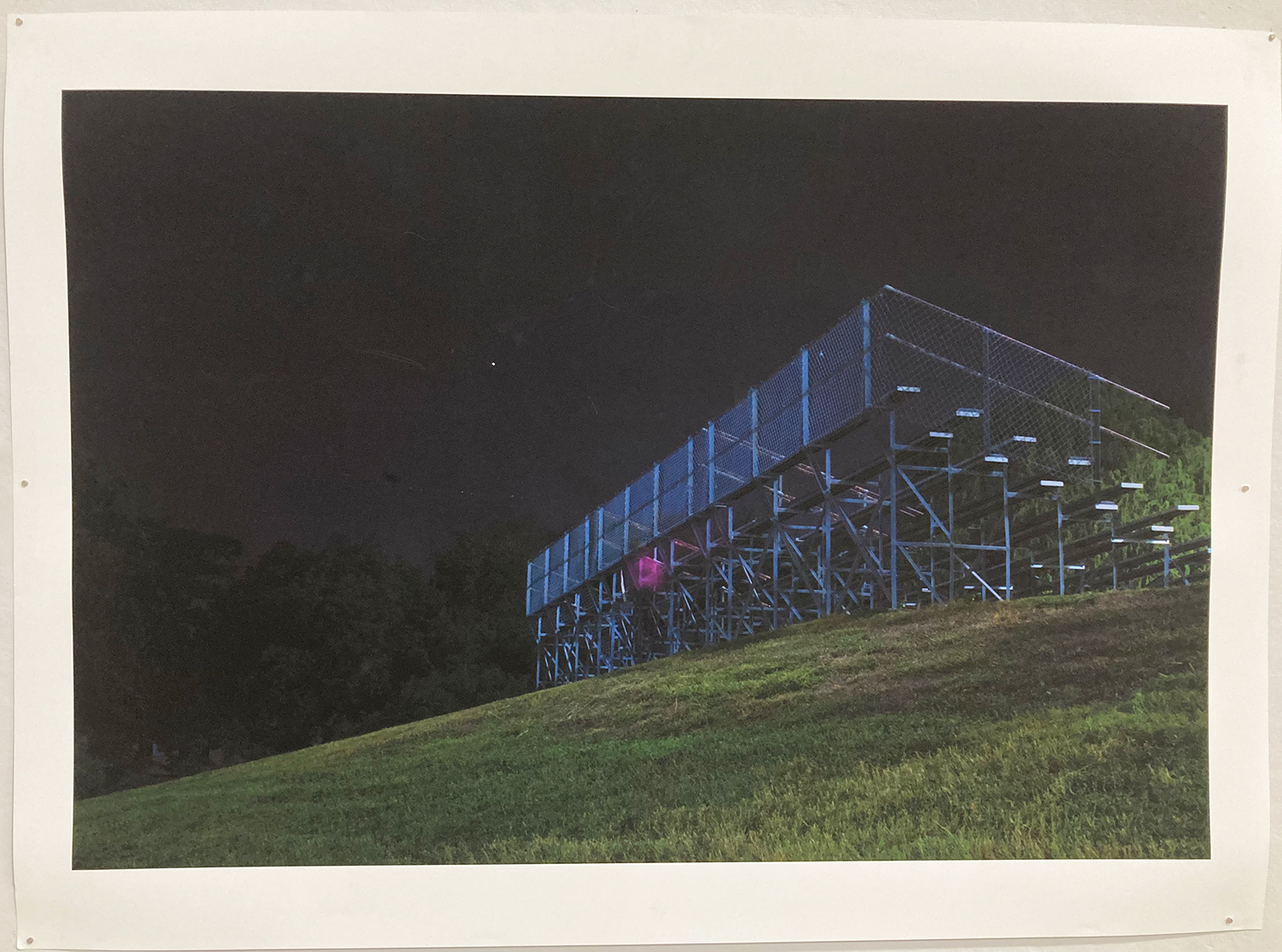 Inkjet print on matte paper; image of risers at night with one star in sight 