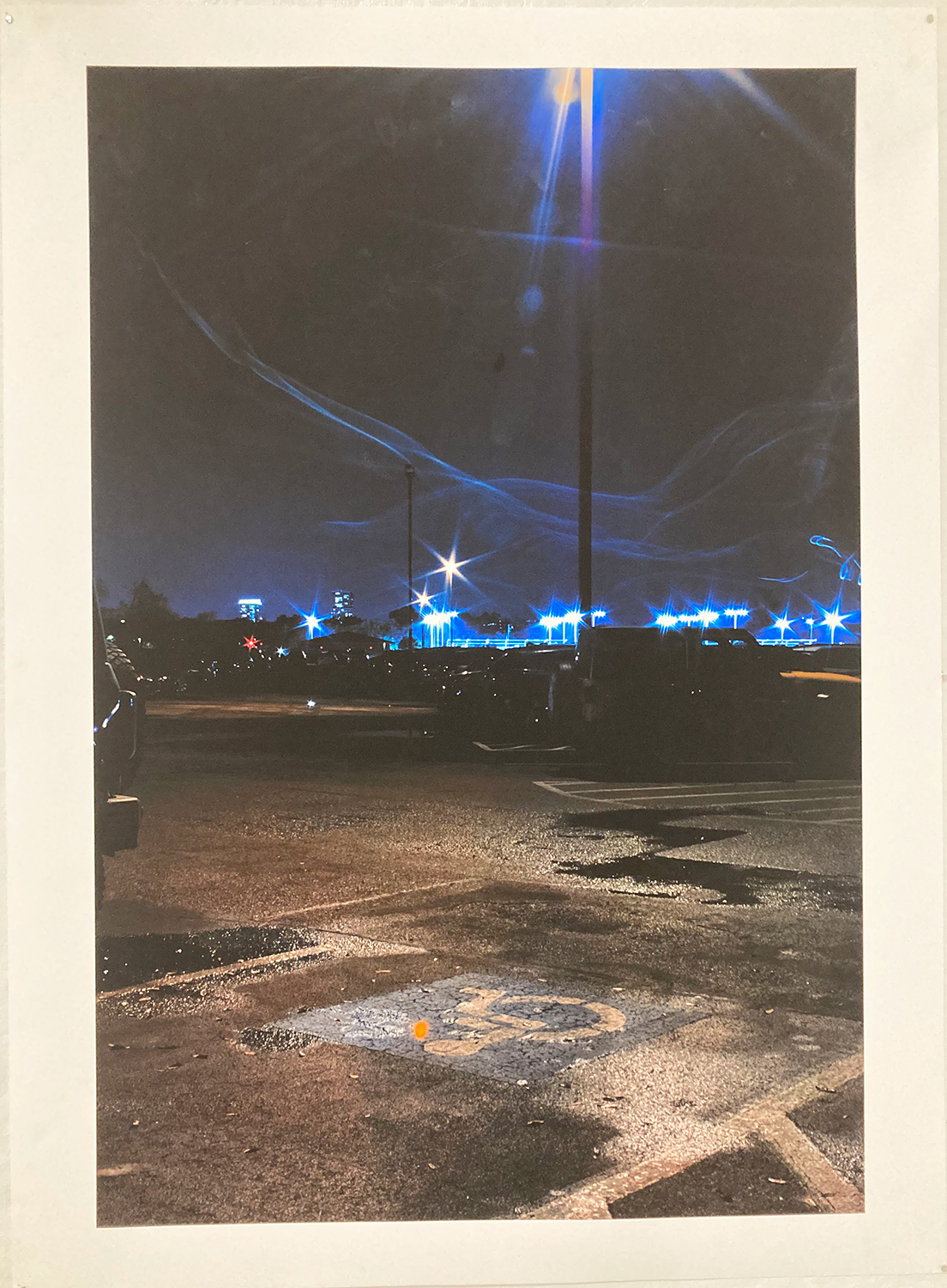 Inkjet print on matte paper; image of a parking lot and lights