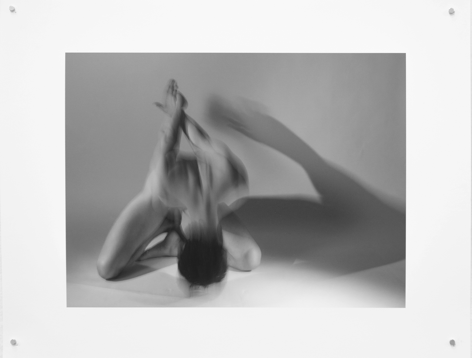 Black and white photograph of a body in motion
