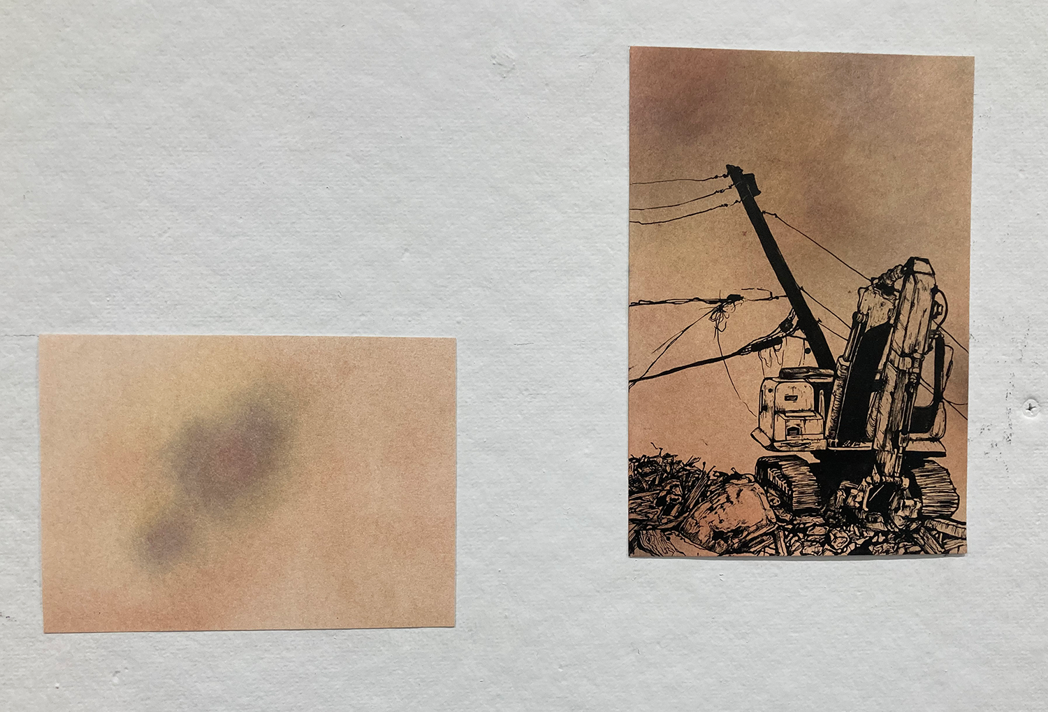 Two sketches, one of a bulldozer, the other just shades of color