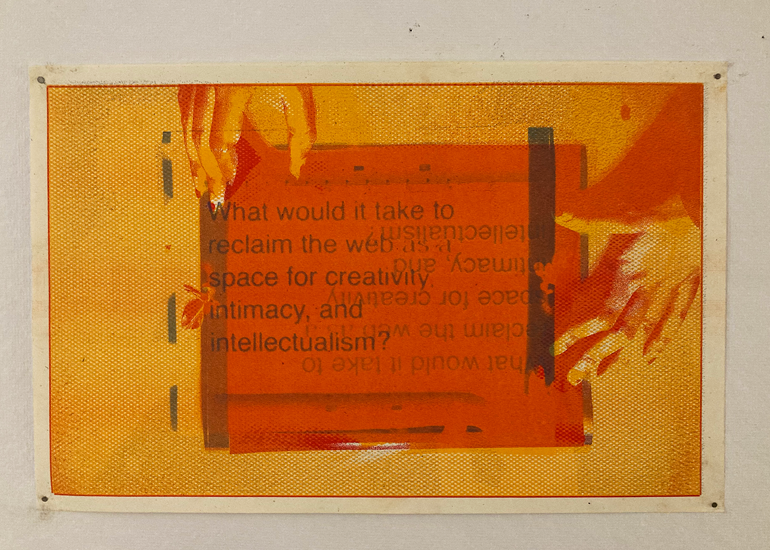 A screenprint of an orange and yellow text