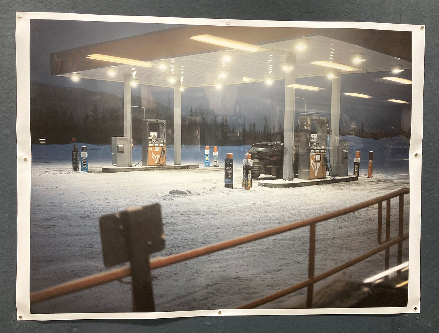 Inkjet print on matte paper, image of a car at a gas station