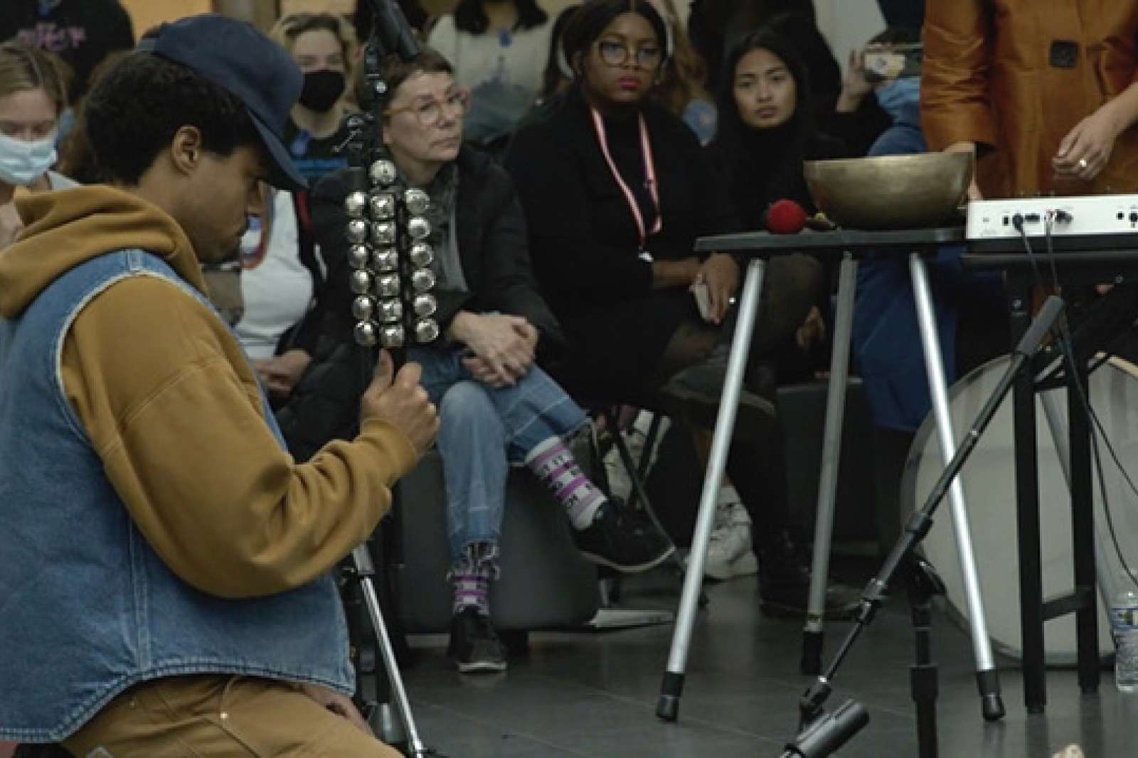 Image of Devin T. Mays playing a musical instrument