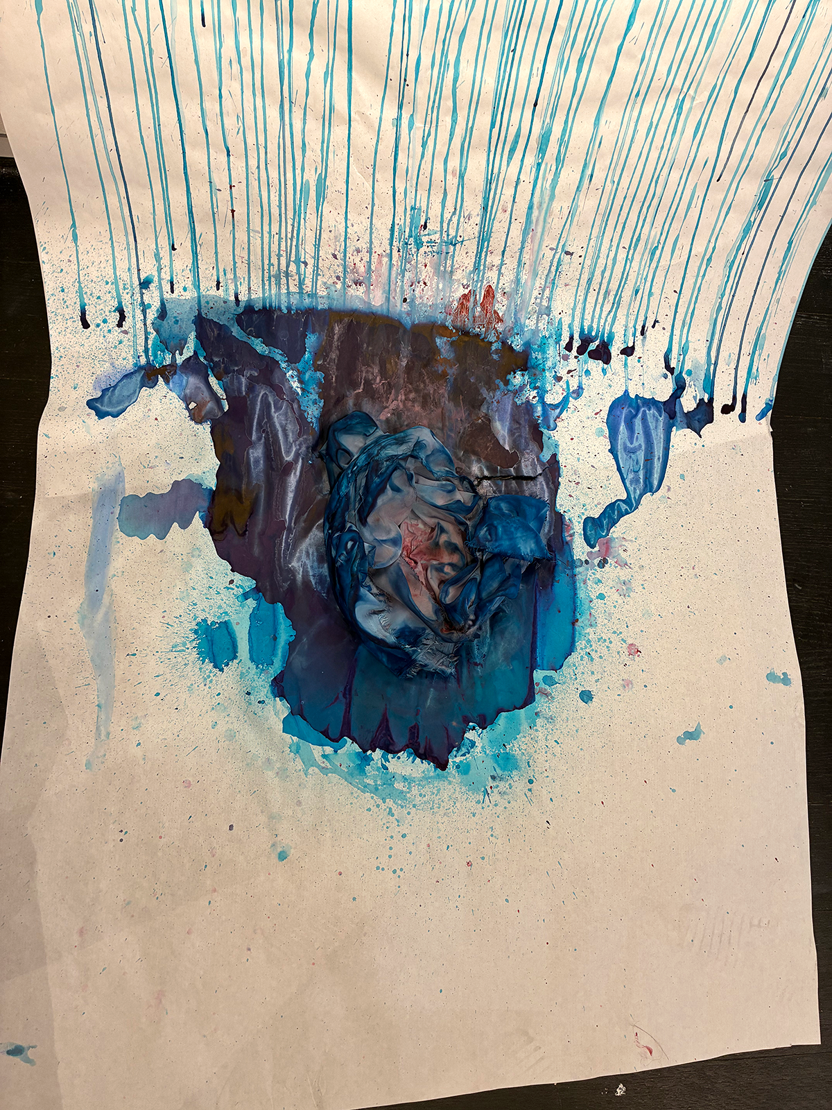 Close up of blue dye puddle