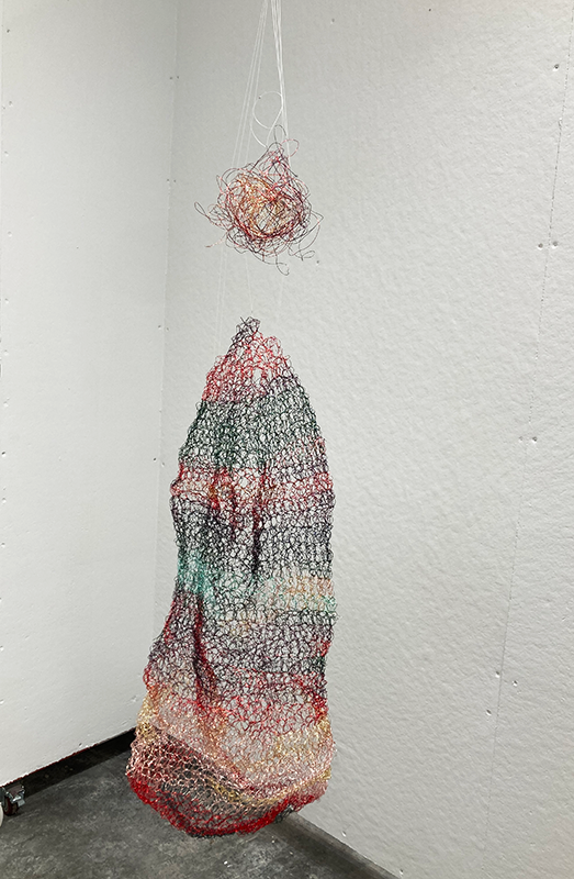 Close up of wired sculpture by Savannah Parrot