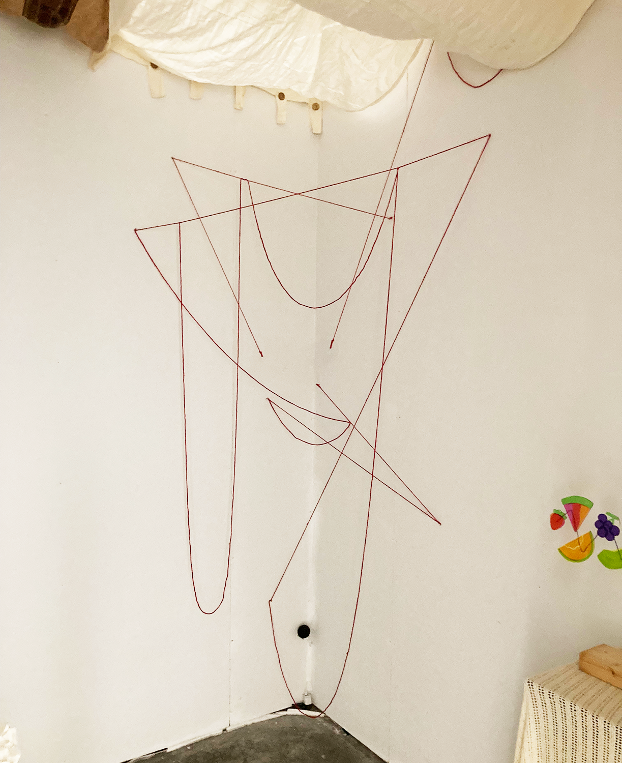 String zig-zaging in a corner of a space