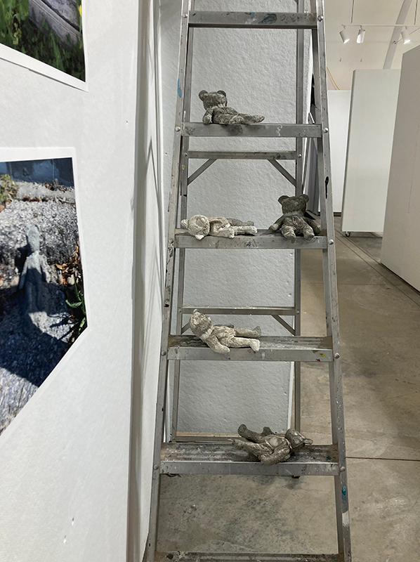 Cement teddy bears by Sydney Little